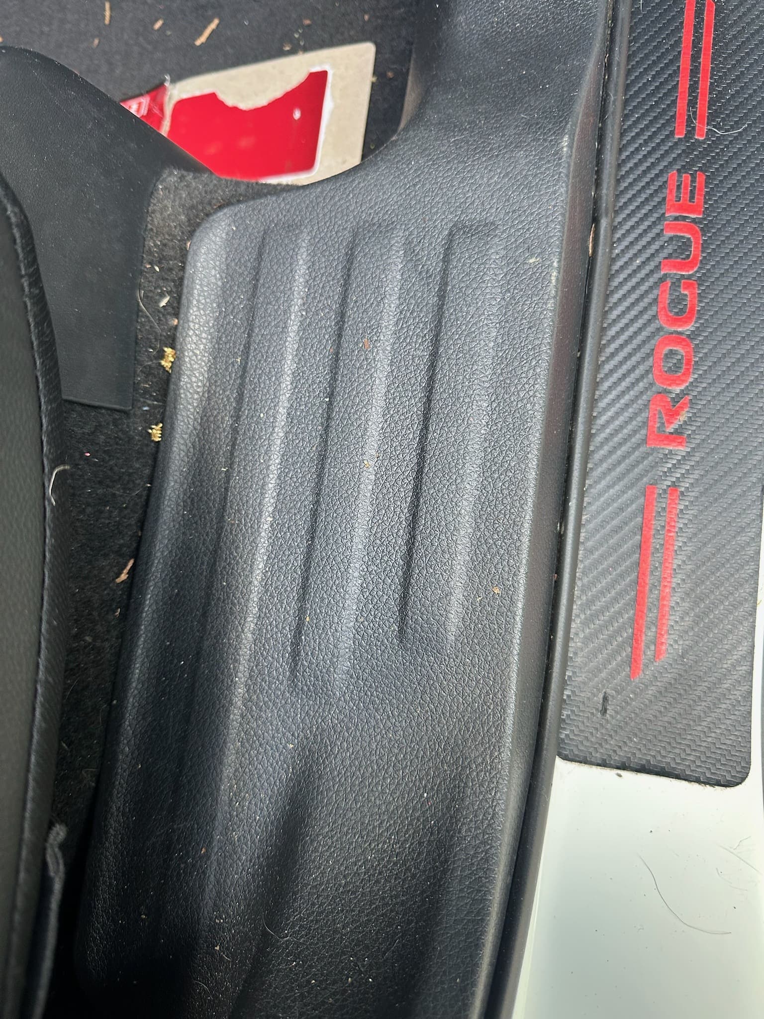 Interior detail — driver-side carpet and trim restored